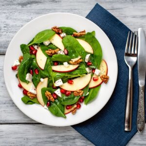 Apple, Pomegranate and Spinach Salad with Feta Cheese, and Toasted Walnuts