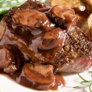 New York Steak with Mushroom Red Wine Reduction Sauce