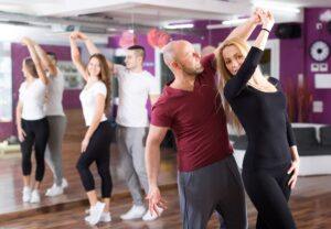 Leisurely dancing couples