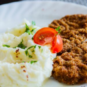 Chicken Schnitzel with Mashed Potatoes and Sweet & Sour Red Cabbage