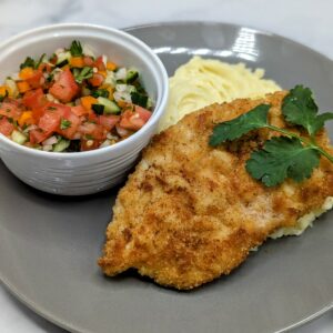 Chicken Schnitzel with Mashed Potatoes and Chopped Israeli Salad