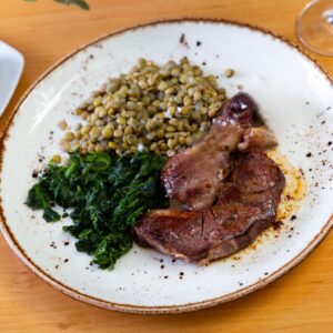 Roasted Pork Tenderloin with Garlic and Spinach Lentils